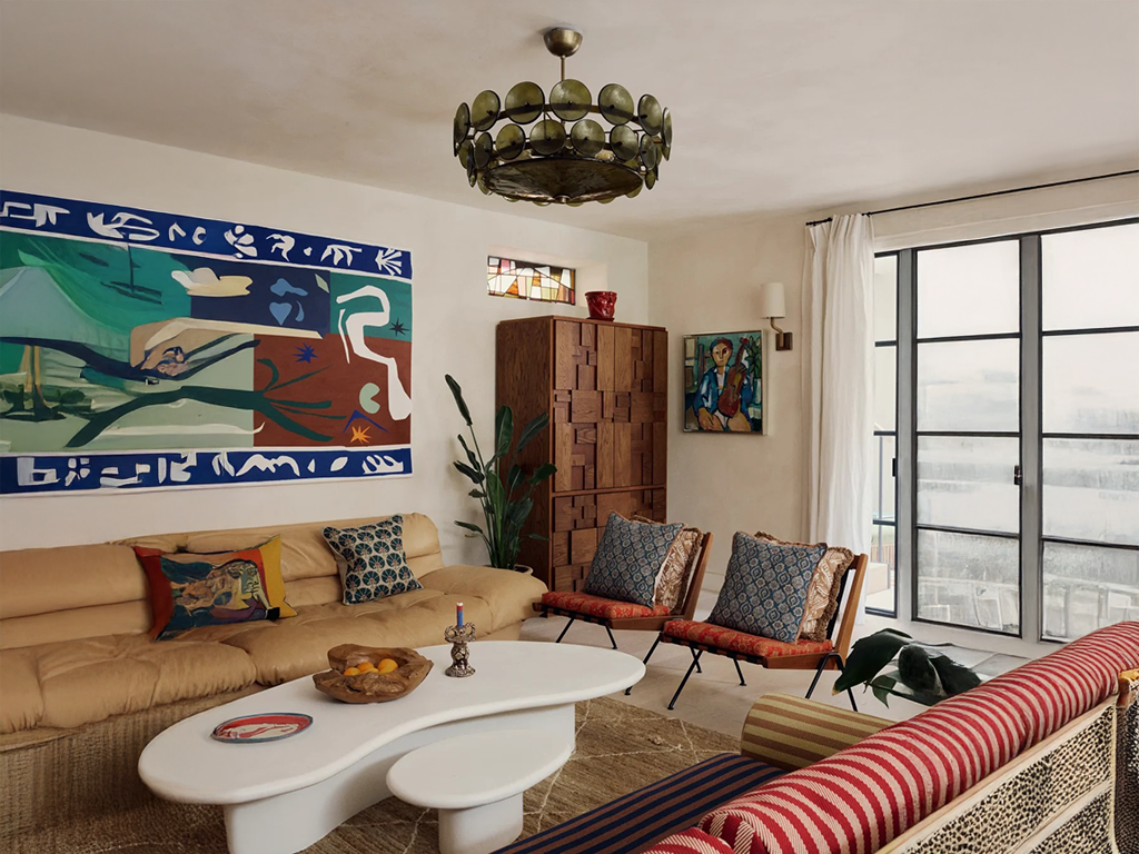 Vintage Glass Chandelier Adds Soul to Eclectic Living Room